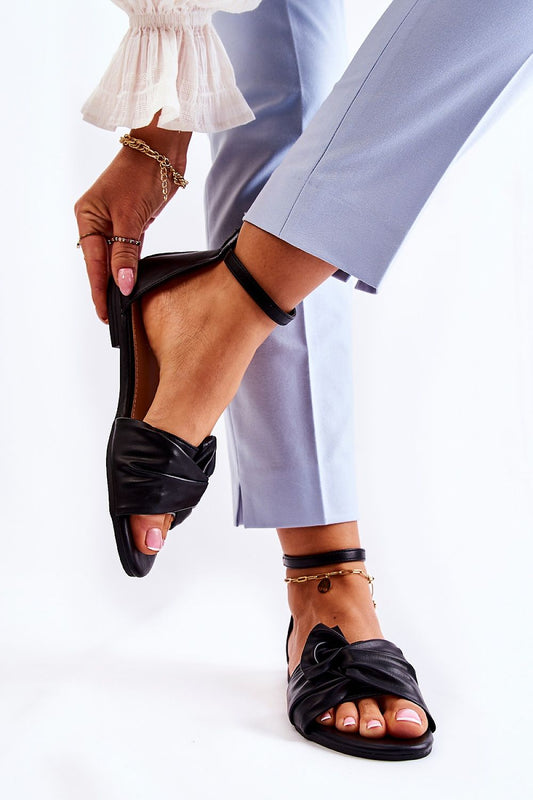 Close-up view of luxurious eco leather women's sandals with adjustable ankle strap, styled by Step in Style, showcasing elegant design and decorative front zipper.