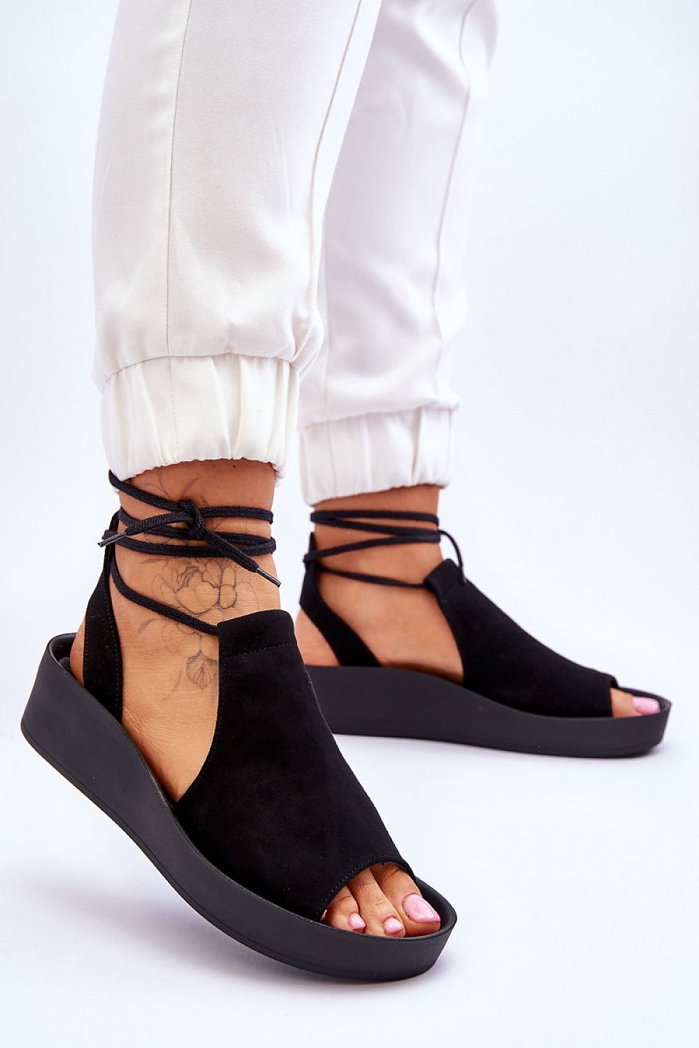 Comfortable and fashionable women's sandals by Step in Style, highlighted with a chic platform and ankle strap for effortless elegance.