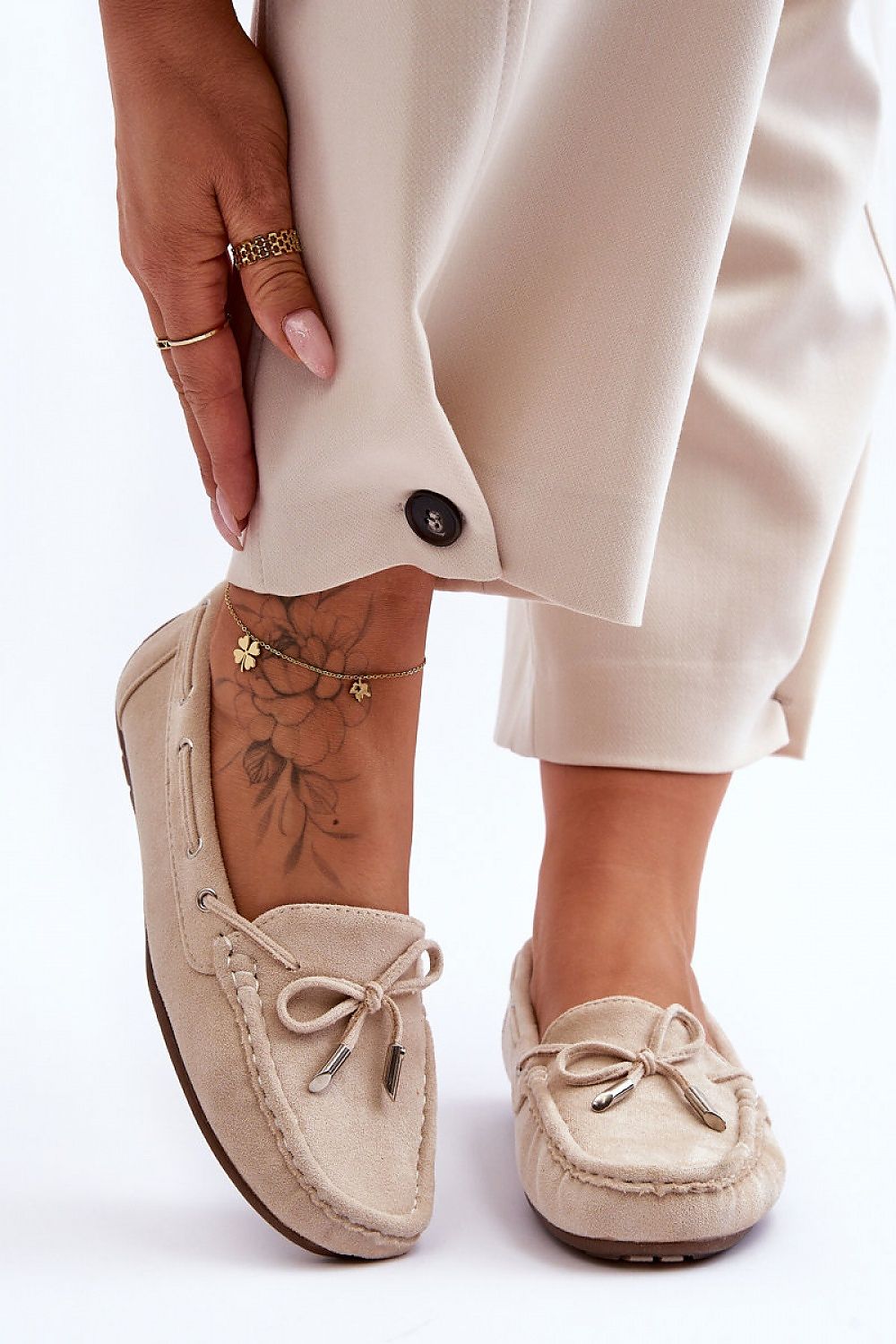 Luxury women's eco-suede moccasins by Step in Style, featuring decorative bow and non-slip sole for ultimate comfort.