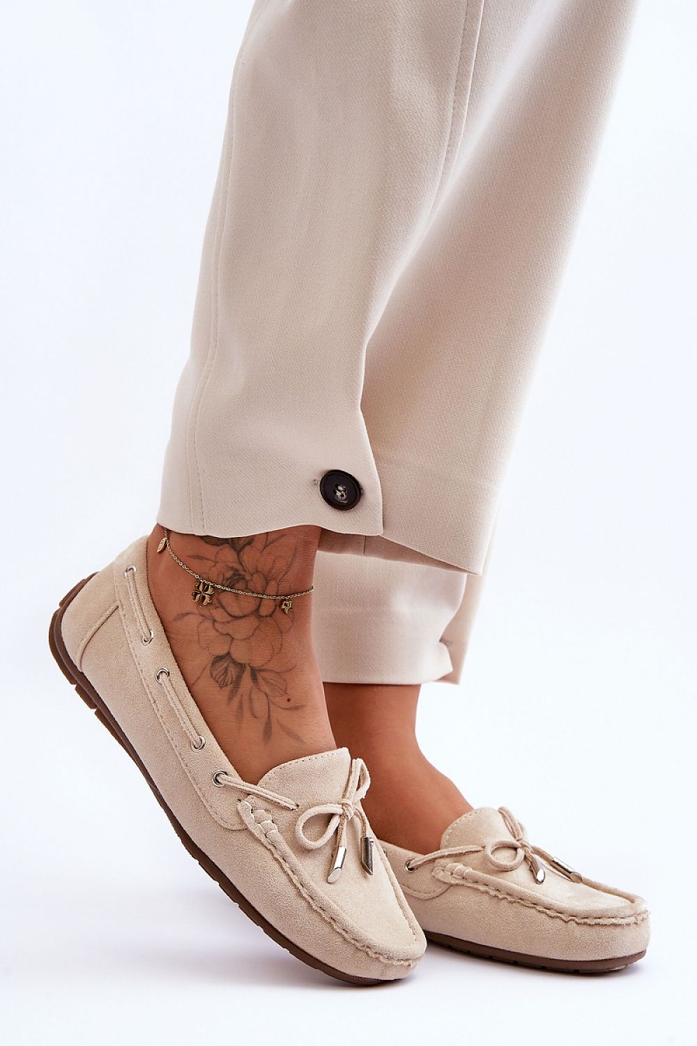 Elegant Women's Eco-Suede Moccasins by Step in Style featuring a decorative bow and luxurious eco-leather insole, perfect for comfort and sophistication.
