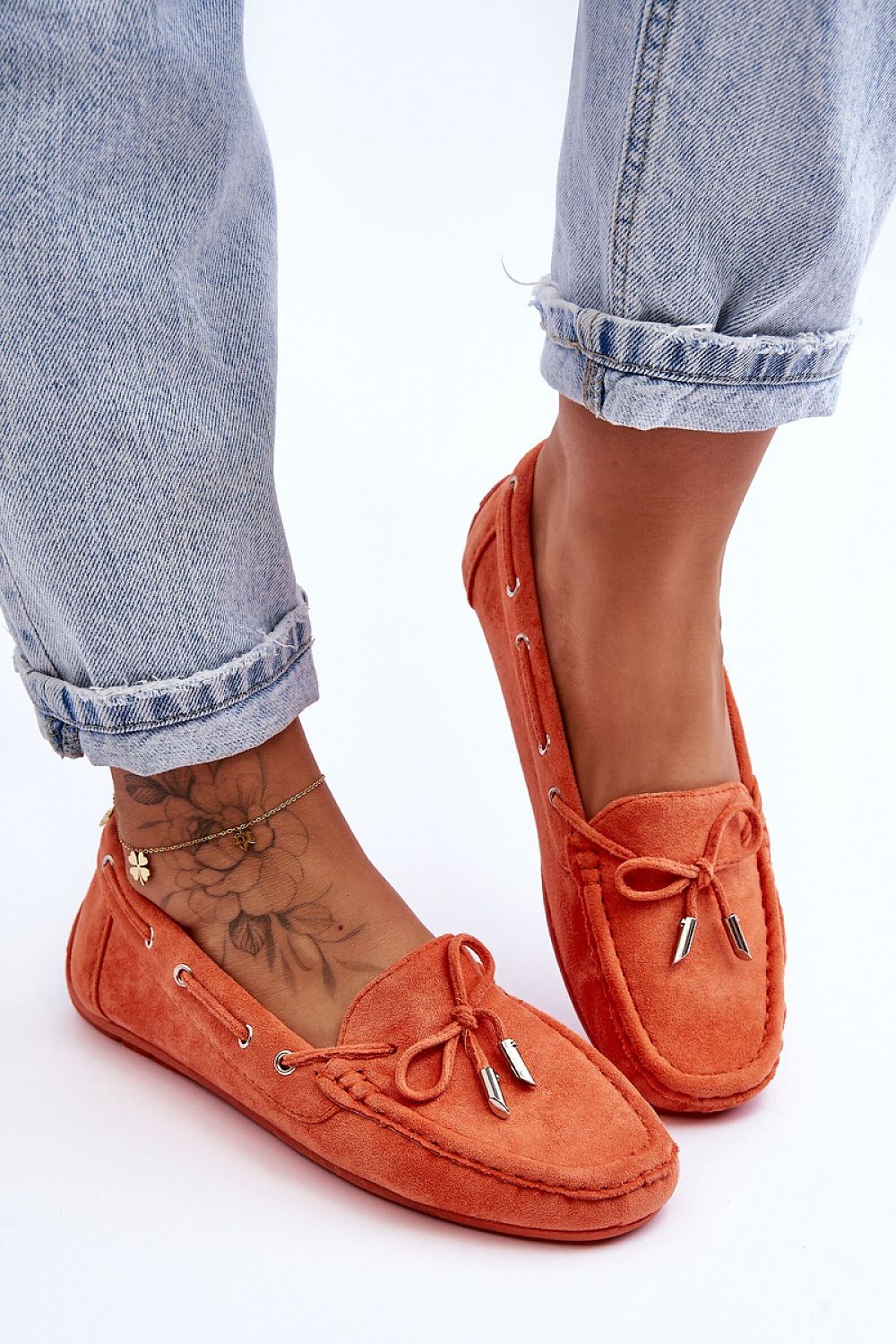 Luxurious women's moccasins crafted from eco-suede by Step in Style, designed with a decorative bow and a soft, non-slip sole for supreme comfort.