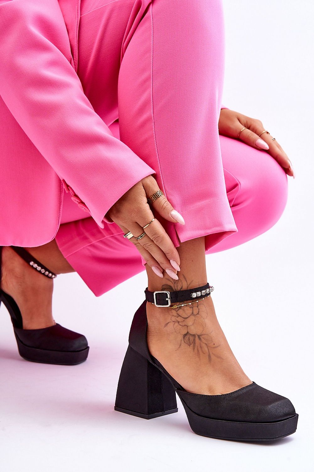 Chic close-up of Step in Style luxury platform pumps, highlighting the eco leather insole and stunning rhinestone buckle detail, perfect for sophisticated occasions.