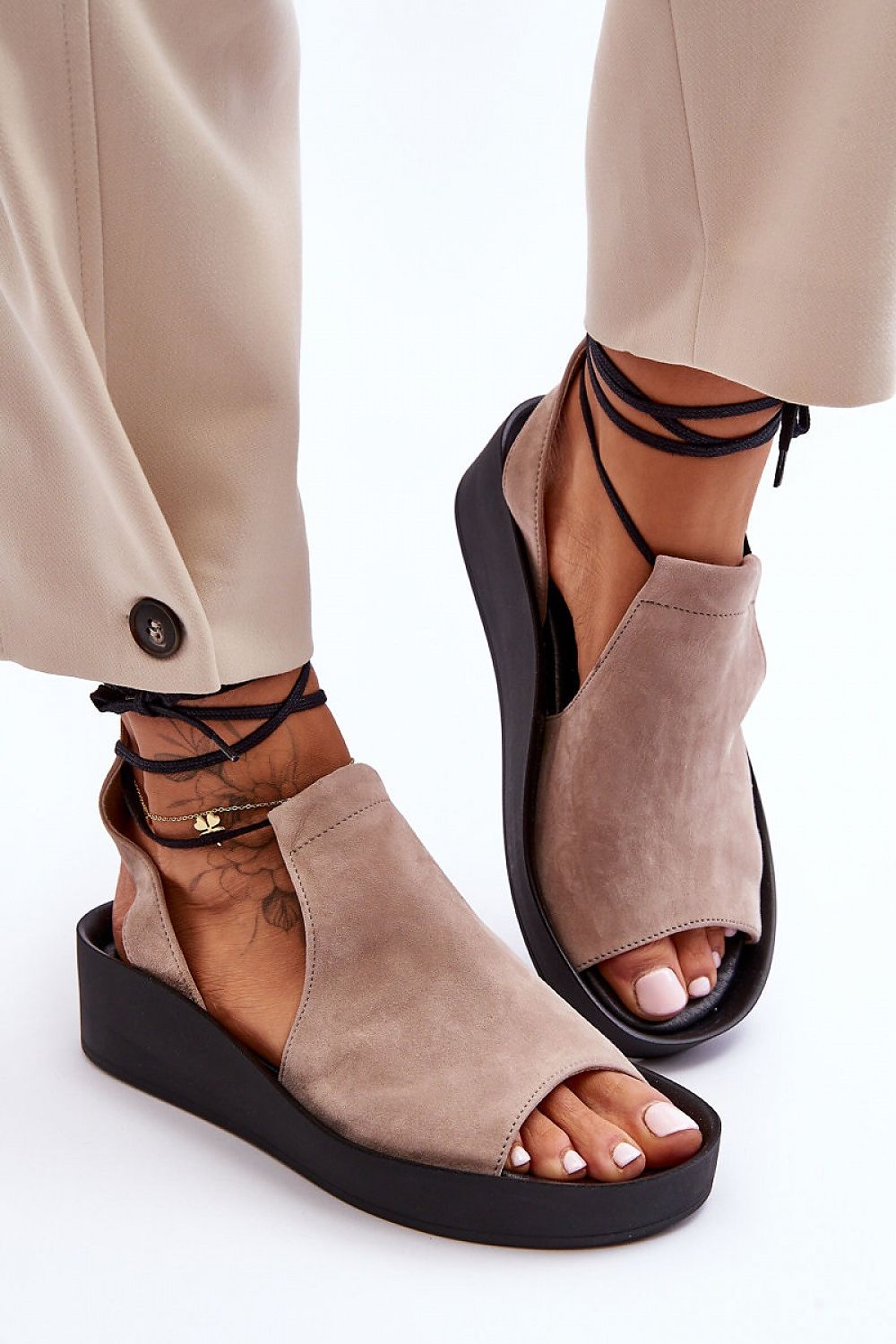Elegant women's natural leather sandals by Step in style, featuring ankle straps and a comfortable platform.