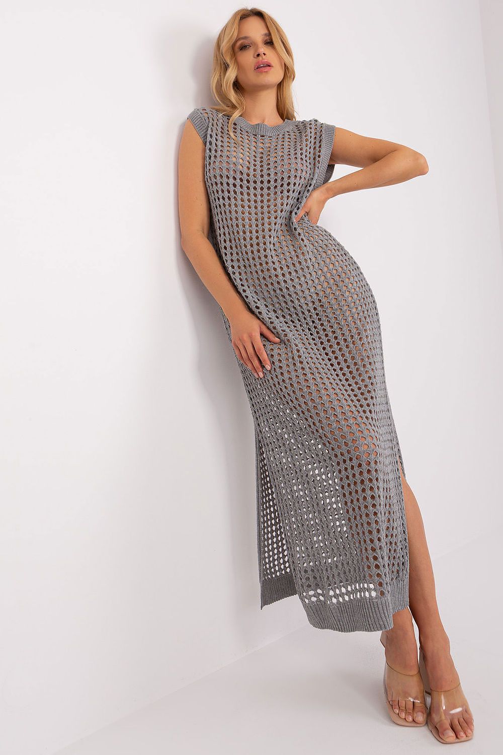 Luxury Openwork Long Knit Beach Dress with Slits by Badu, showcasing a stylish sleeveless design perfect for summer beach outings.