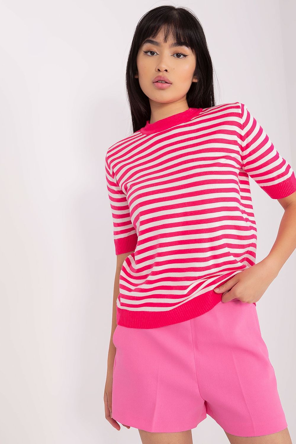 Exquisite Badu knitted blouse in colourful stripes, showcasing short sleeves and an elegant round neckline, ideal for sophisticated casual wear.