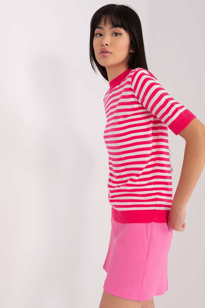 Stylish short-sleeved knitted blouse by Badu, adorned with colourful stripes and a refined round neckline, perfect for adding luxury to any outfit.