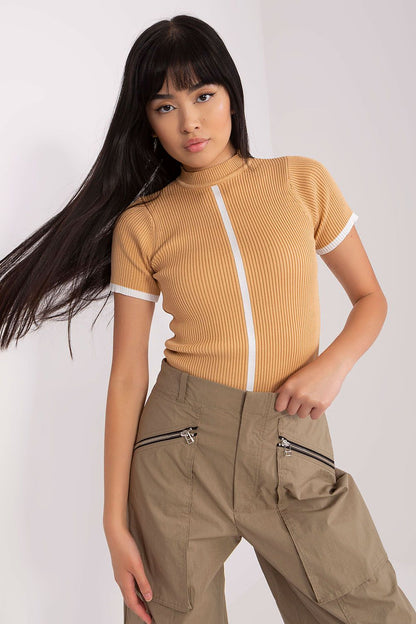 The Badu ribbed blouse styled with a half turtleneck, exemplifying modern elegance and comfort for daily wear.