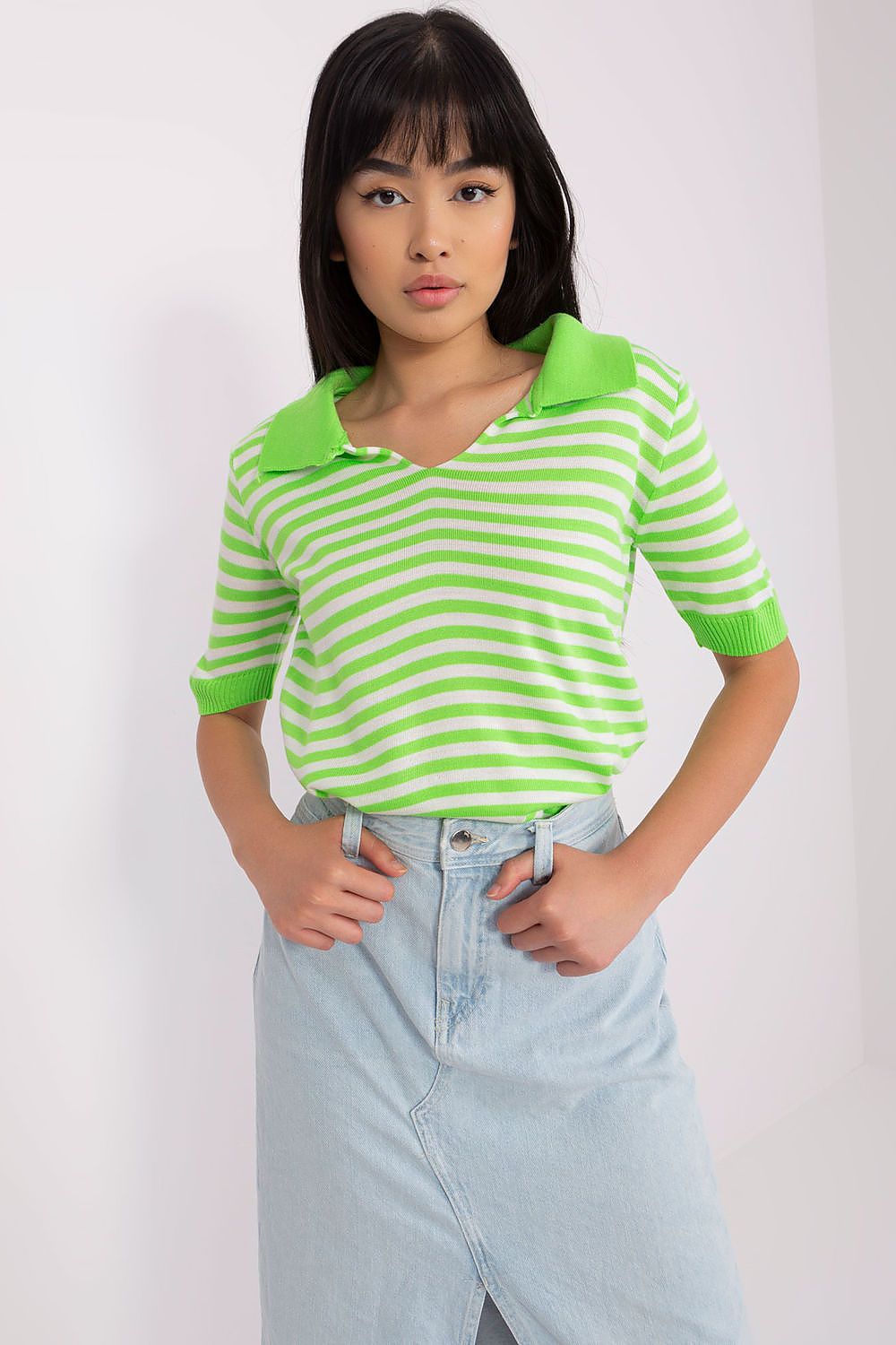 Full view of Badu's luxury striped knitted blouse in EU size 0, demonstrating an elegant silhouette and exquisite textile composition.