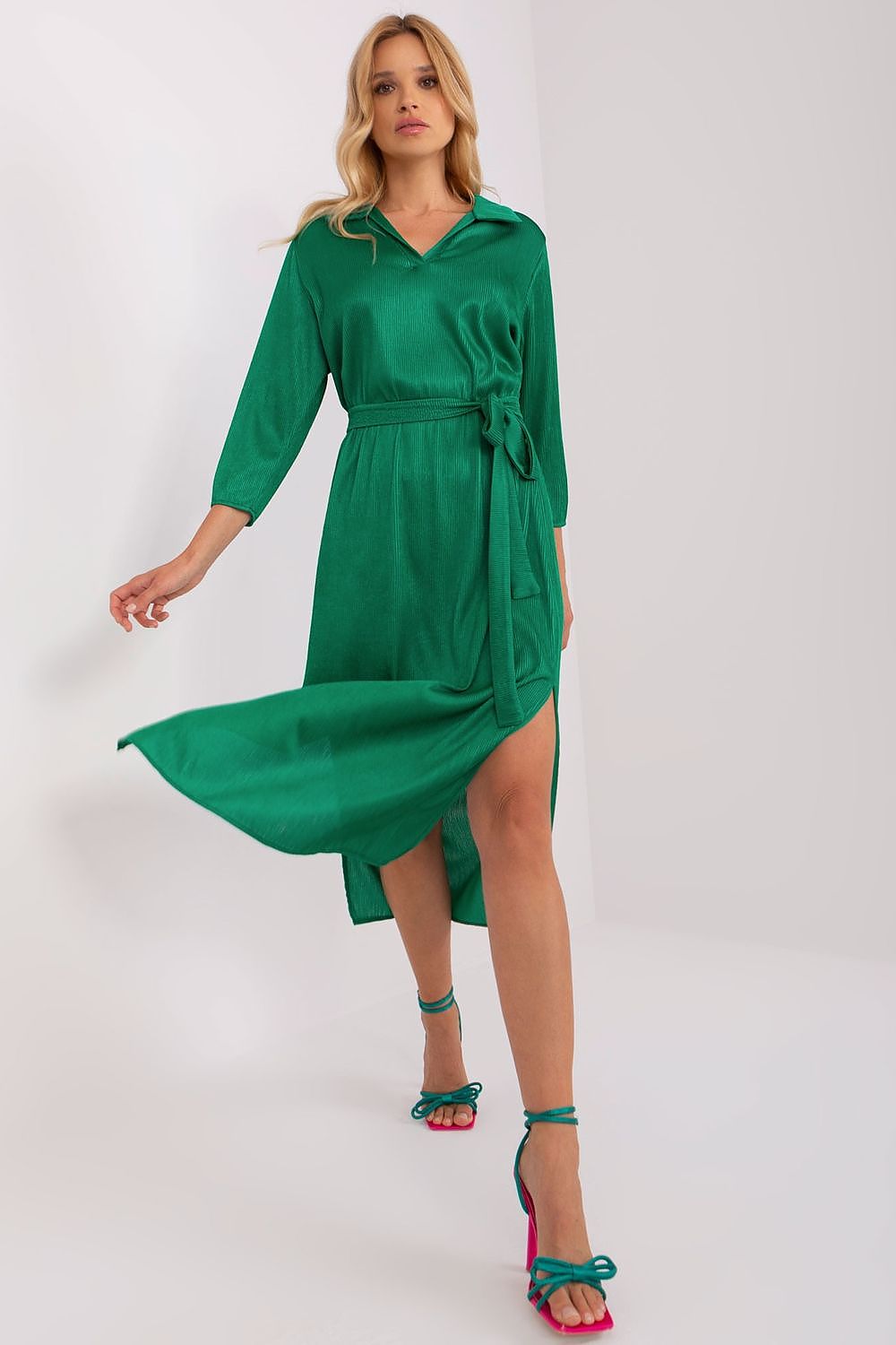 Elegant Lakerta daydress featuring 3/4 sleeves and a chic V-neck collar, enhanced with a waist tie and crafted from luxurious ribbed fabric.