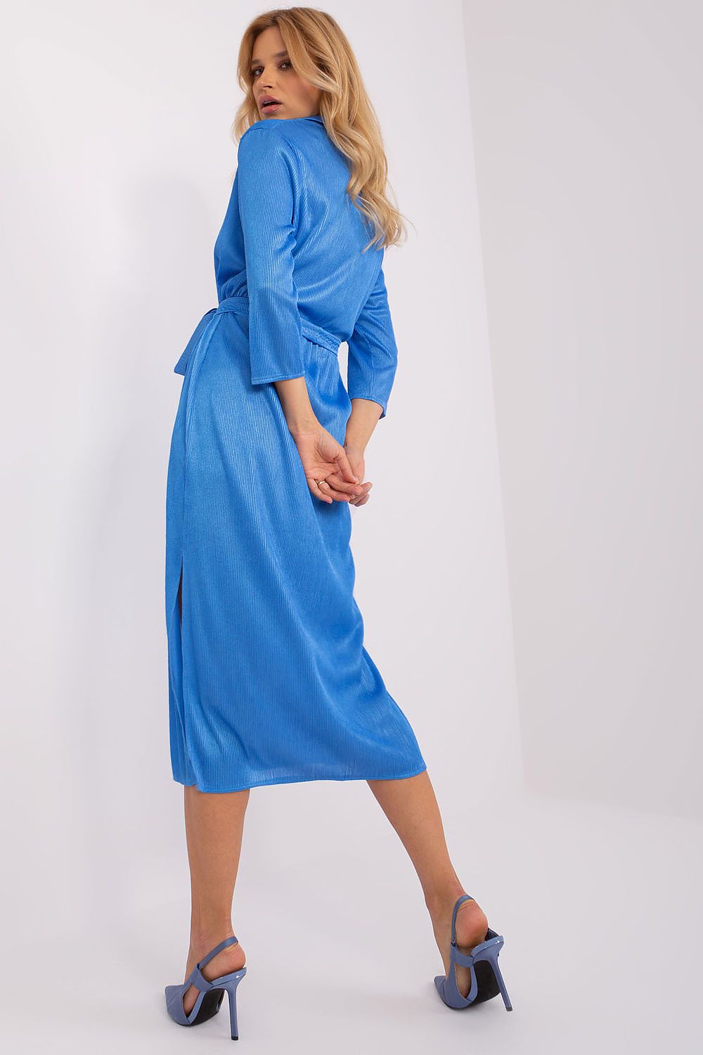 Stylish Lakerta daydress showcasing chic 3/4 sleeves and a flattering waist tie, designed in luxurious ribbed fabric for a timeless look.