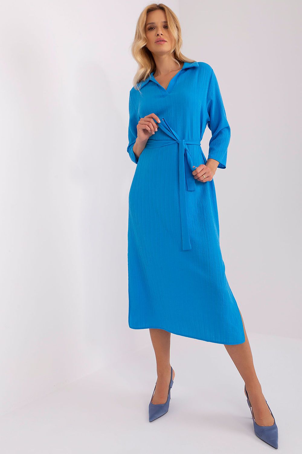 Elegant daydress with 3/4 sleeves from Lakerta Collection, featuring a stylish waist tie and sophisticated side slits.