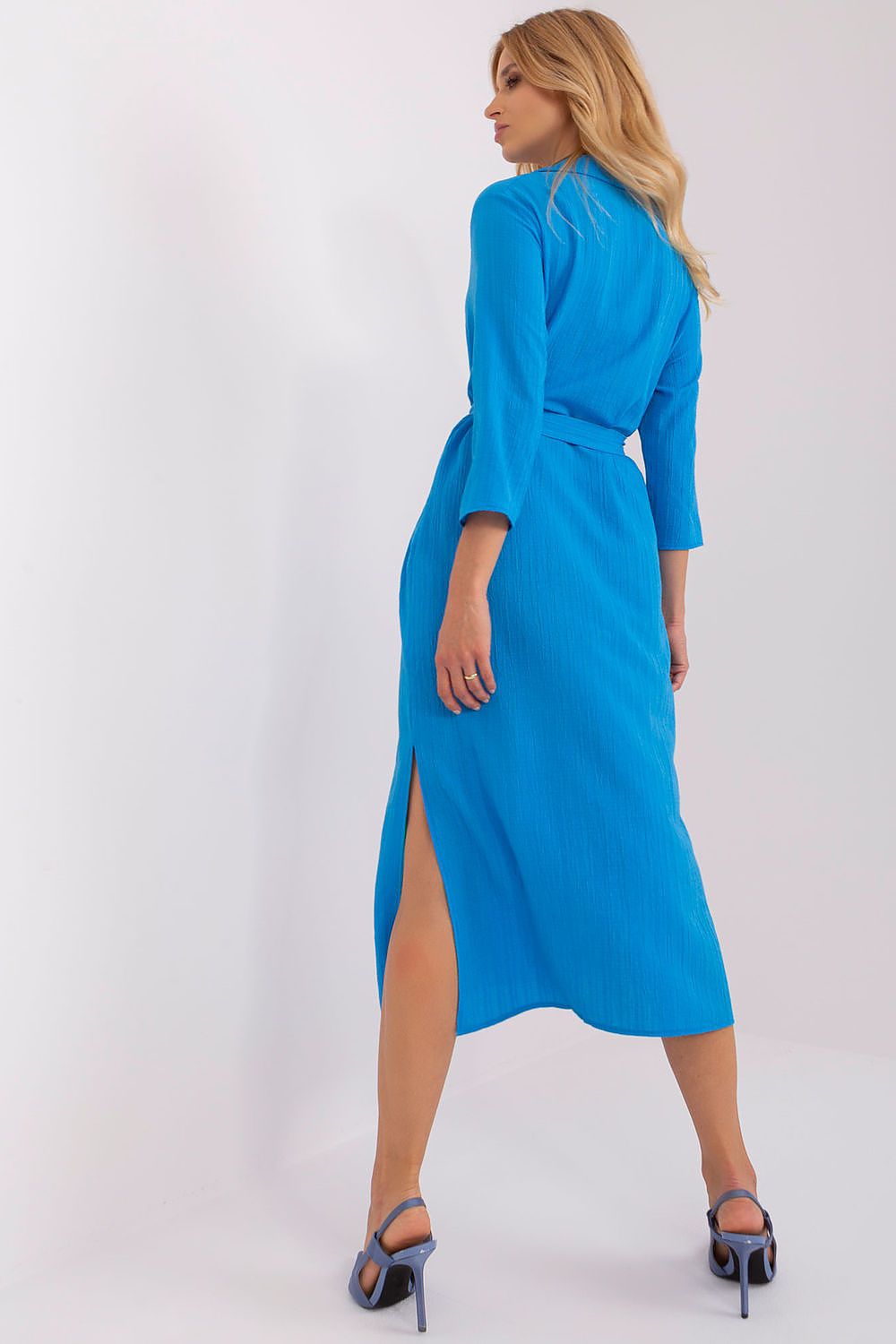 Chic daydress with refined side slits and 3/4 sleeves, crafted by Lakerta for a sophisticated everyday look.