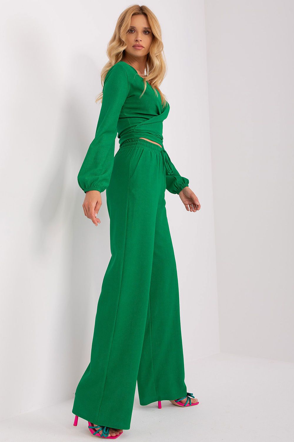 Tailored pants with tie detail and slip pockets from Lakerta's luxury casual collection.