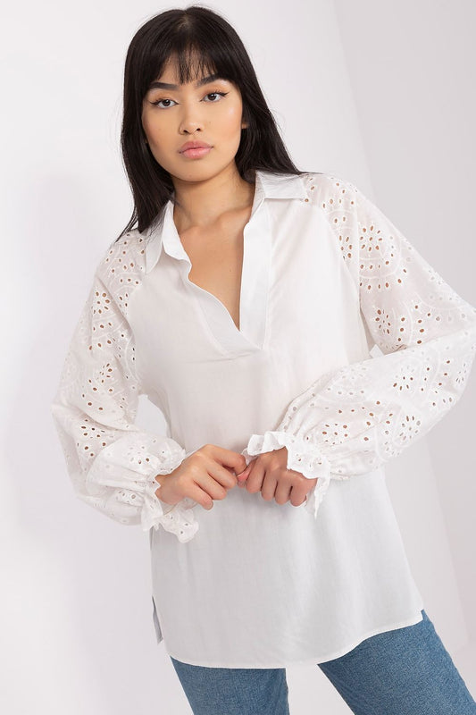 Close-up of Lakerta's viscose blouse, highlighting the delicate openwork design and luxurious fabric, perfect for various occasions.