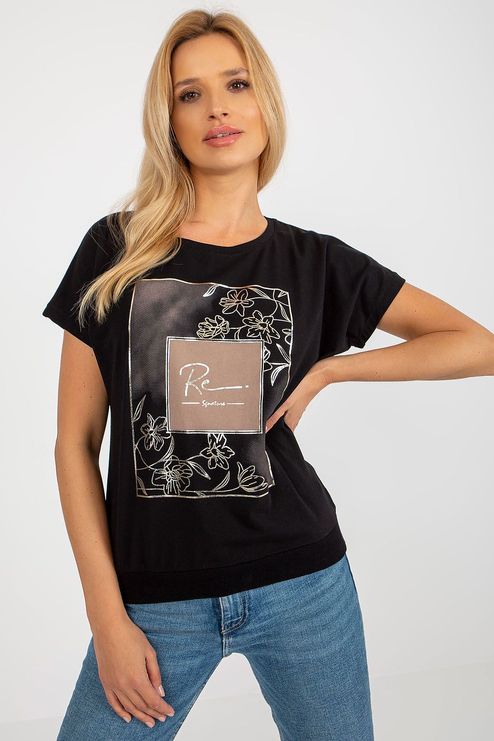 Elegant Rue Paris blouse showcasing a decorative print, featuring a round neckline and short sleeves, crafted from a luxurious cotton blend.