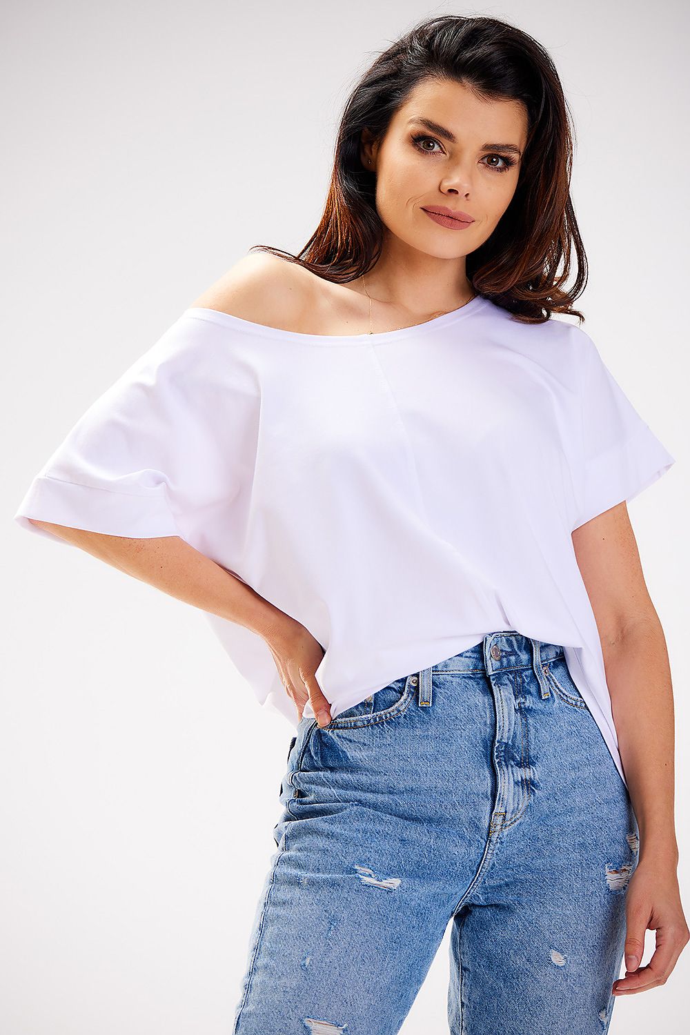 Stylish arrangement of the Luxury Loose T-Shirt with deep boat neckline by Infinite You, perfect for versatile fashion looks.