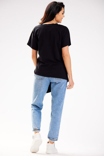 Stylish model wearing Infinite You's asymmetrical cotton blouse, exuding elegance and modern design for a luxury feel.