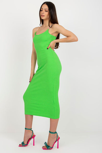 Full body view of a model wearing the Elegant Ribbed Pencil Cut Dress by Relevance, ideal for both casual and formal events.