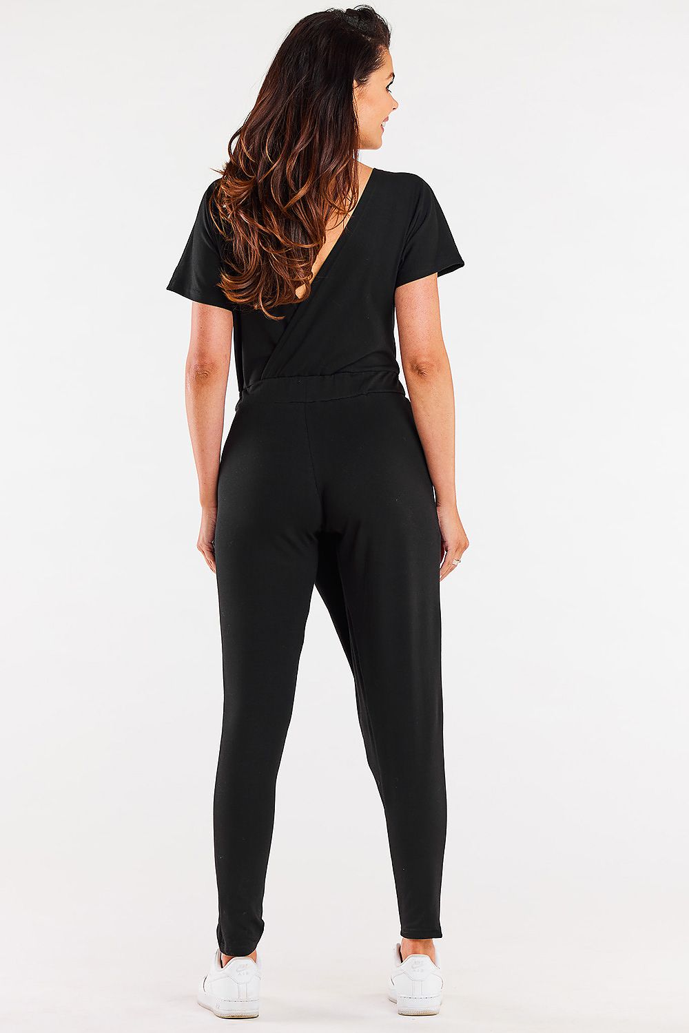 Wide elastic waistband of the Infinite You luxury jumpsuit, highlighting the stylish category of contemporary women's fashion.