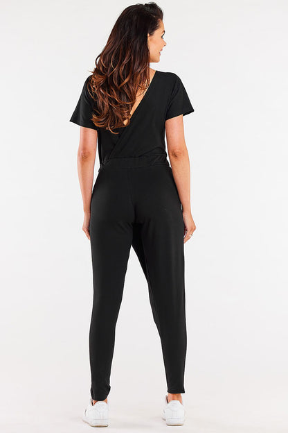 Wide elastic waistband of the Infinite You luxury jumpsuit, highlighting the stylish category of contemporary women's fashion.
