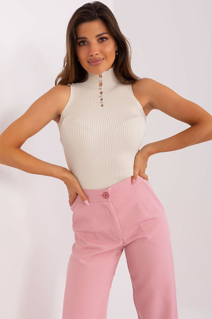 Luxury sleeveless turtleneck blouse by Badu featuring decorative zircons and elegant ribbed fabric, perfect for sophisticated outfits.