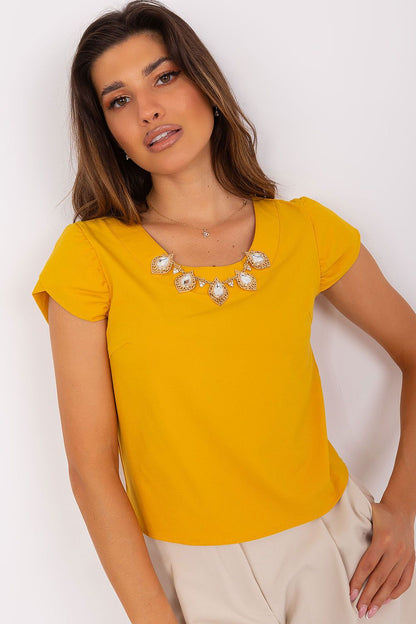 Luxurious Lakerta blouse featuring short sleeves, a round neckline, and exquisite front jewelry embellishment, perfect for elegant occasions.