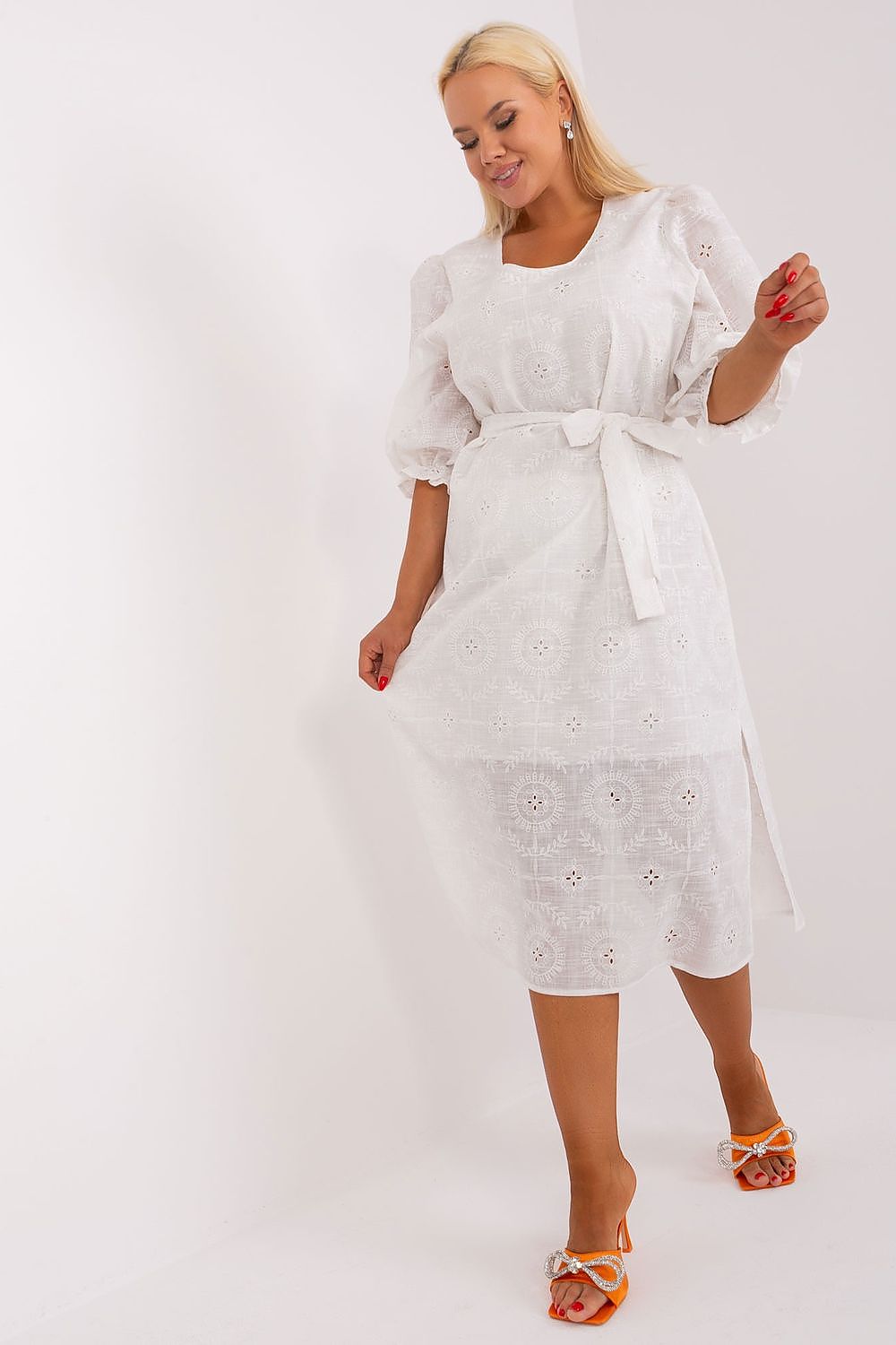 Luxurious plus size cotton dress with intricate embroidery, featuring 3/4 sleeves and a tie waist, by Lakerta.
