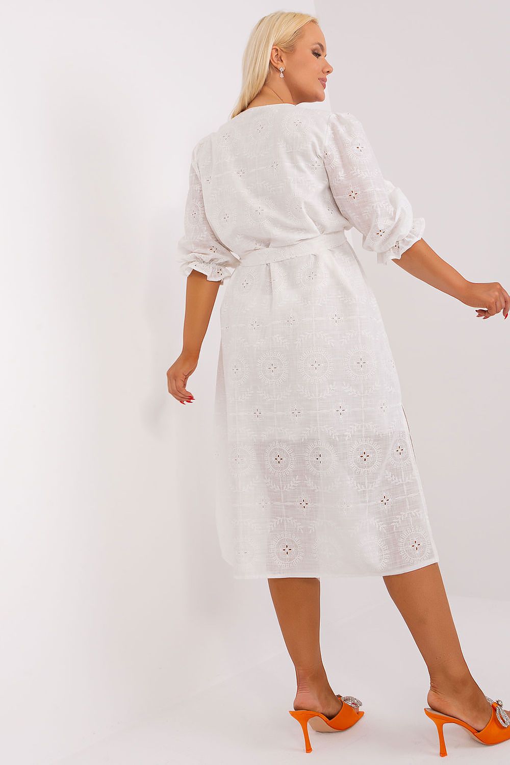 Detail of the elegant embroidery on a plus size cotton dress designed by Lakerta, showcasing 3/4 sleeves and a flattering silhouette.