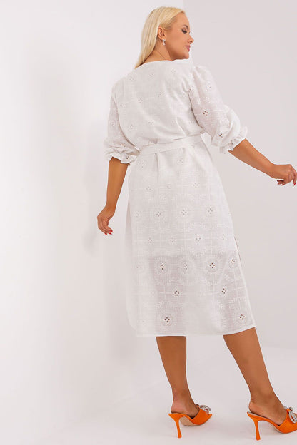Detail of the elegant embroidery on a plus size cotton dress designed by Lakerta, showcasing 3/4 sleeves and a flattering silhouette.