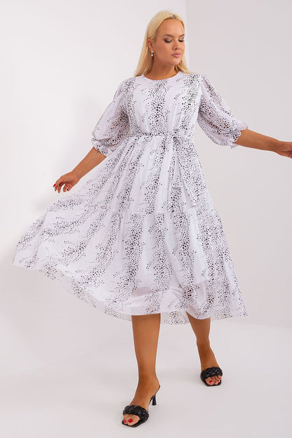 Elegant Lakerta plus size dress with 3/4 sleeves and a sophisticated round neckline, ideal for special occasions.
