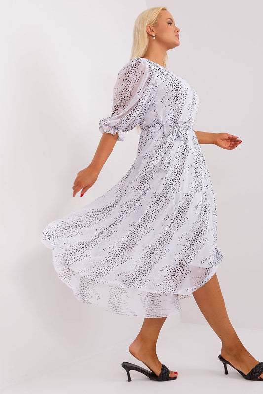 Luxurious Lakerta dress featuring a flattering tie waist and high-quality cotton-nylon blend fabric, perfect for curvier silhouettes.