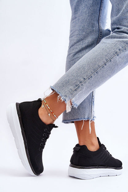 Sleek design of Step in Style lace-up sports shoes showcasing a flexible plastic sole, combining style with comfort for everyday elegance.