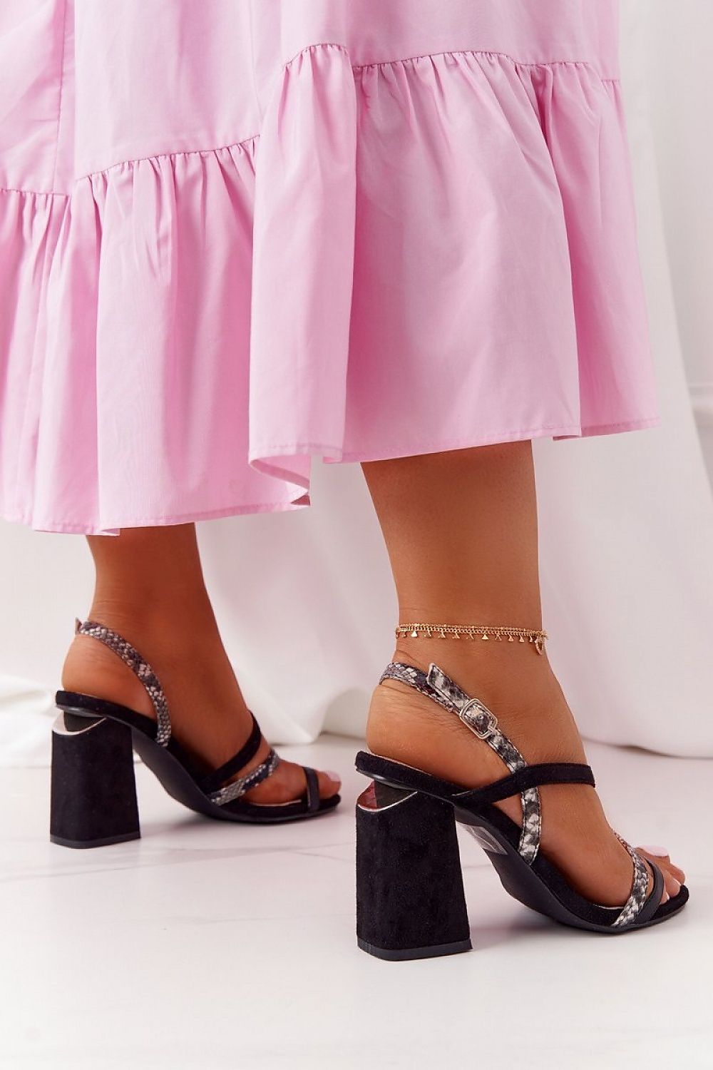 S.Barski's chic eco-suede heeled sandals showcased with a non-slip sole and 10cm stiletto heel, perfect for sophisticated occasions.