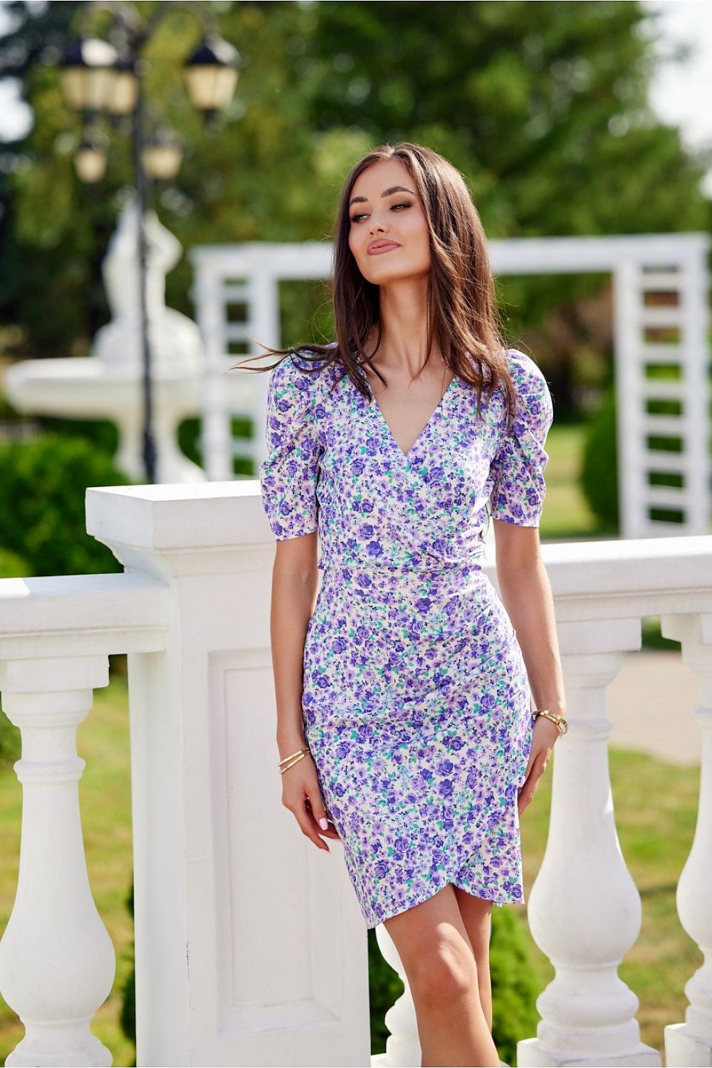 Chic pre-knee length mini dress by Roco Fashion, adorned with beautiful patterns and ruffled sleeves, ideal for fashionable women.