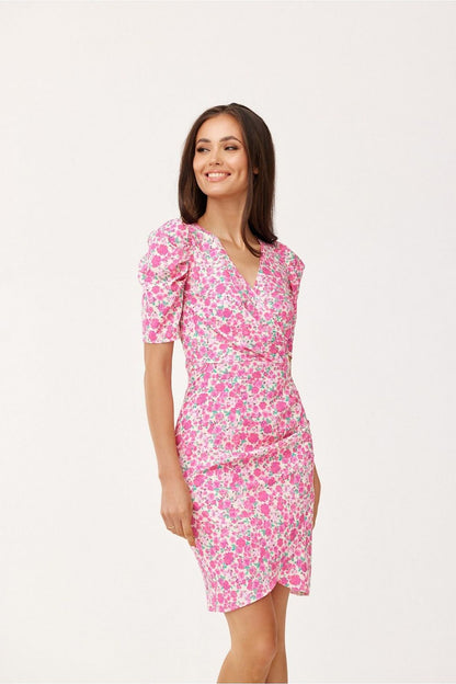 Back view of the mini dress with envelope neckline and tailored fit by Roco Fashion, designed for sophistication and comfort.