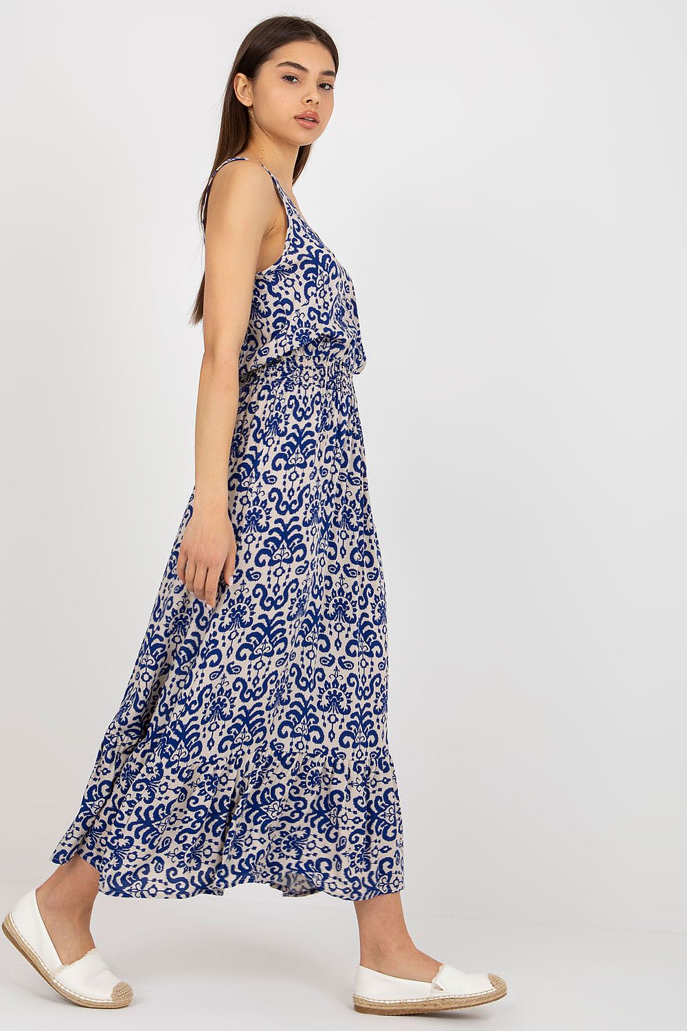 Full-length image of the Fresh Made long summer dress, highlighting the ruffle detailing at the bottom and flattering waist fit.