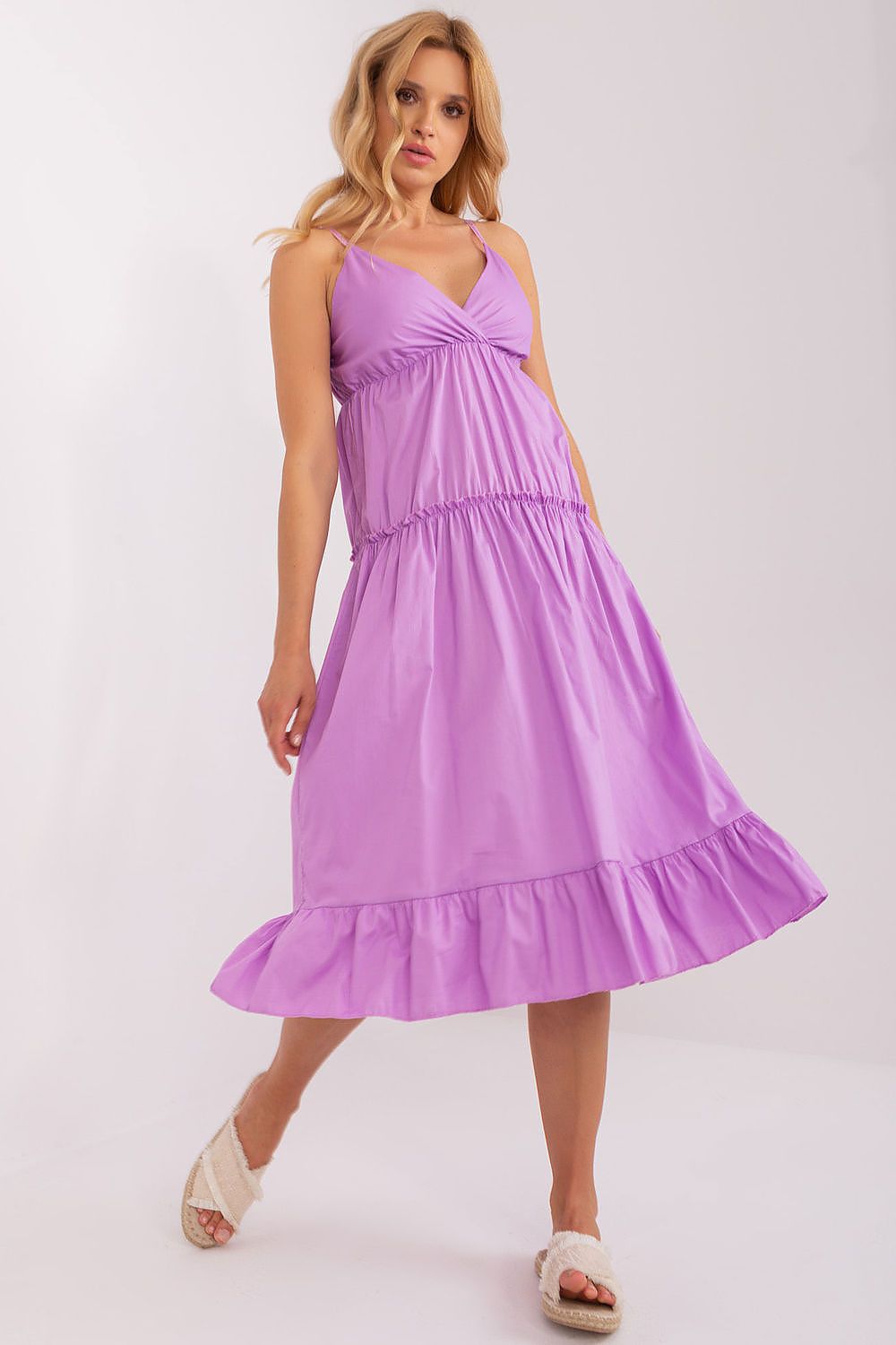 Model wearing the Och Bella women's summer dress, presenting a graceful look with decorative ruffles and adjustable straps for ultimate comfort.