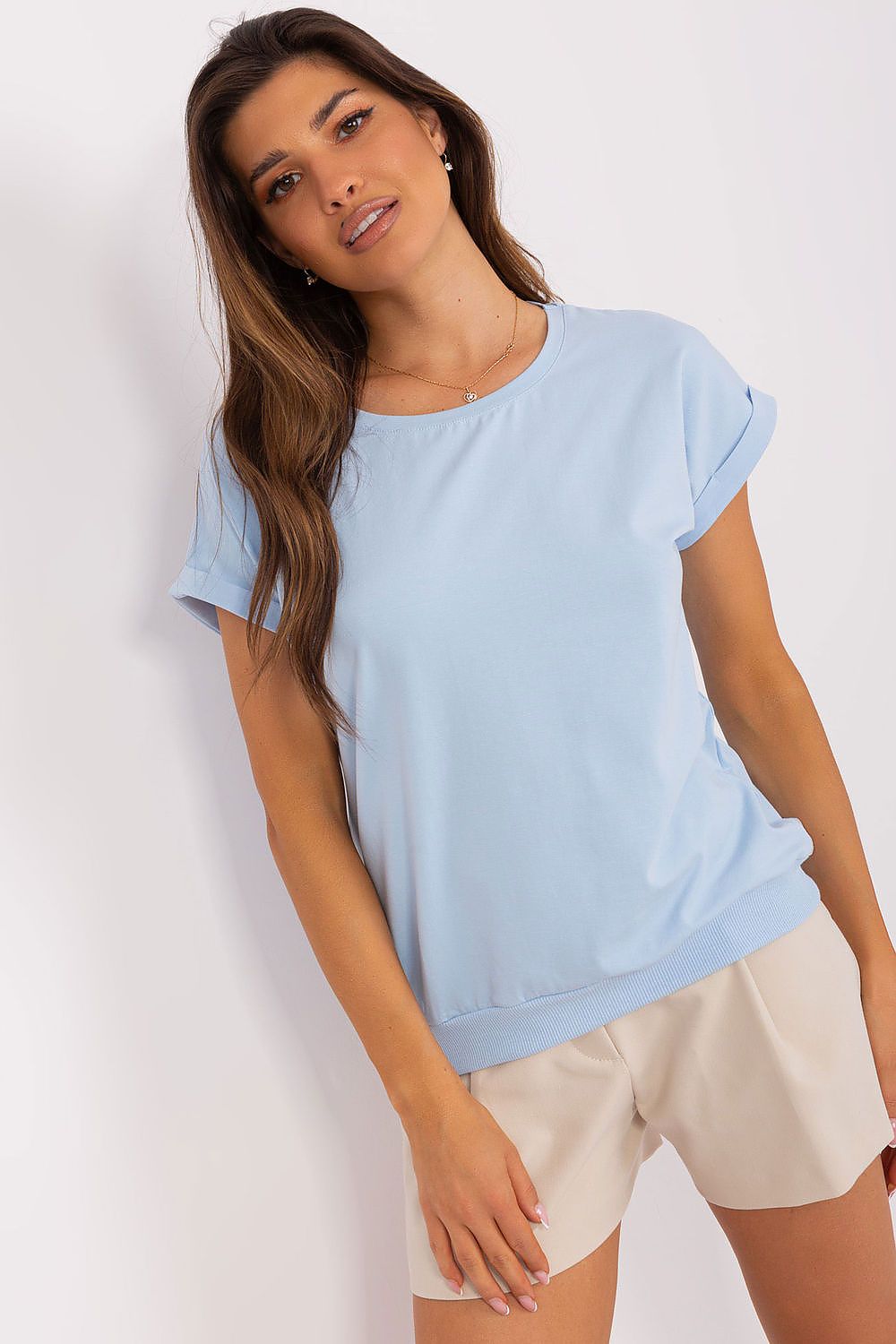 Close-up of the elegant cotton and spandex blouse by Relevance, highlighting its exquisite decorative heart-shaped mesh insert.