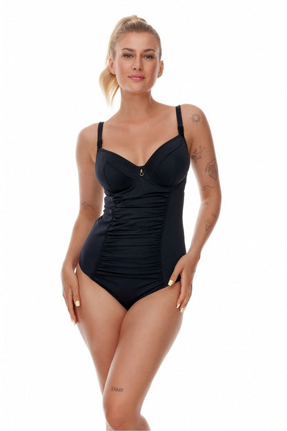Elegant black one-piece swimsuit with open back and decorative crease from Lupo Line, perfect for sophisticated beach outings.