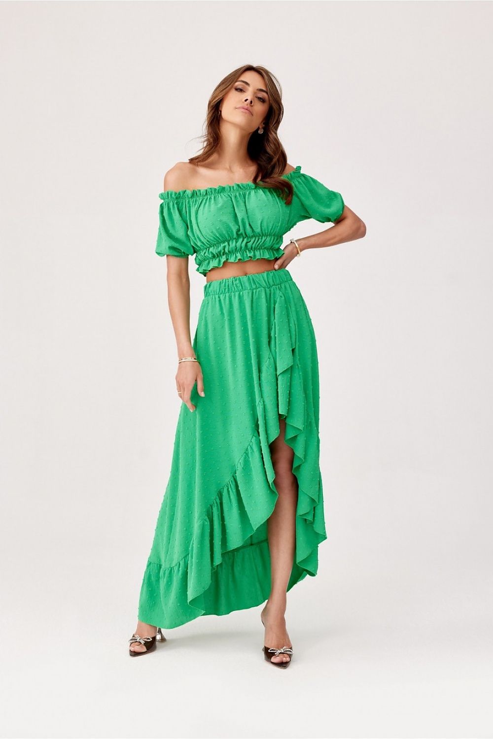 Luxurious asymmetrical skirt by Roco Fashion, showcasing exquisite ruffles and a comfortable elastic waistband.