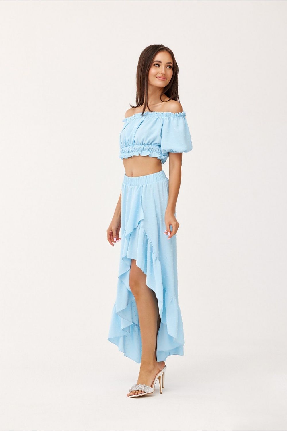 Luxurious Roco Fashion asymmetrical blouse and skirt set in soft fabric featuring frills and an elegant design, perfect for stylish summer outings.