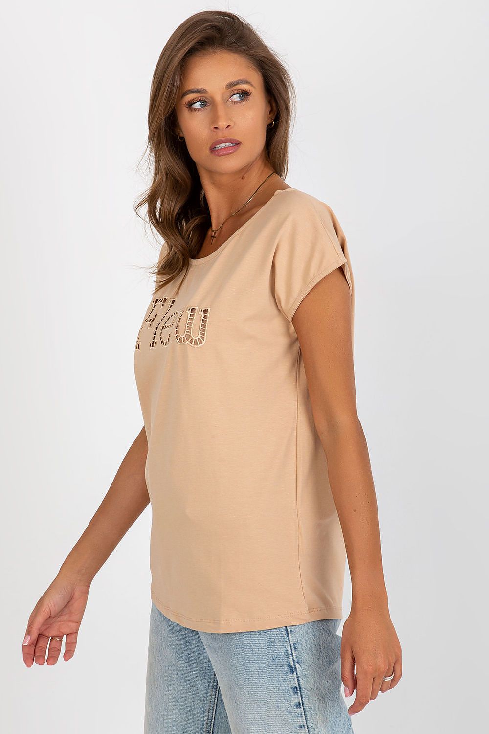 Elegant luxury women's beige casual t-shirt with cut-out inscription 'Flew', designed by Fancy. Perfectly paired with trendy denim for a sophisticated everyday style.