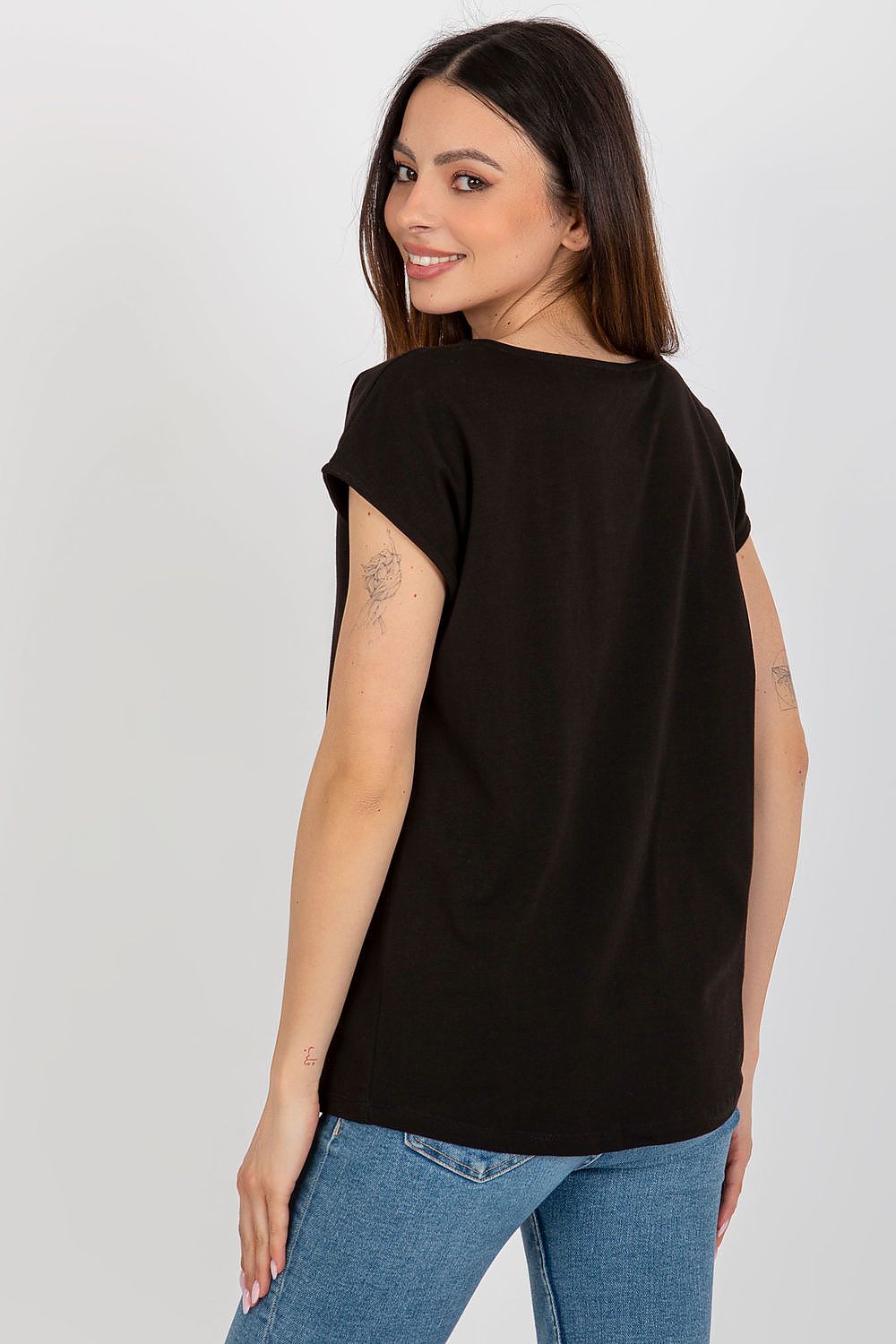 Stylish luxury women's black t-shirt featuring a unique cut-out inscription 'Flew', elegantly designed by Fancy. A luxurious choice for modern casual wear.