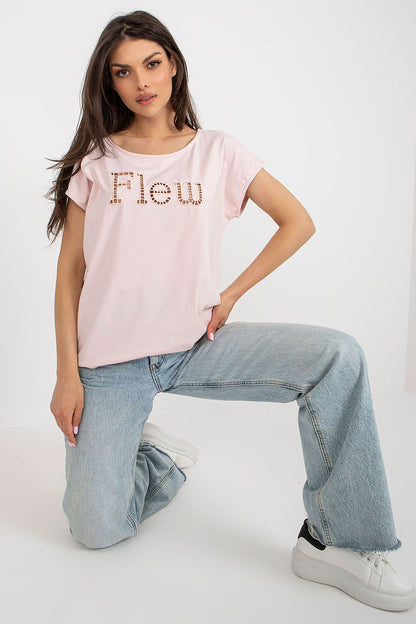 Luxury women's casual pink t-shirt by Fancy with decorative cut-out inscription 'Flew', styled for a contemporary and relaxed fashion.