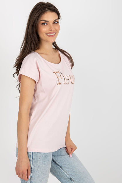 Luxury women's casual pink t-shirt by Fancy highlighting decorative cut-out inscription 'Flew', designed for elegance and comfort in everyday wear.