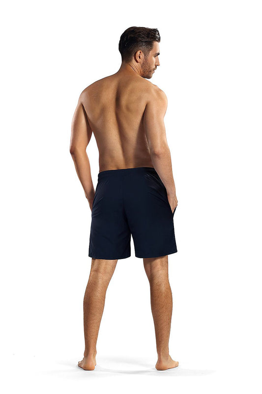 Back view of Lorin men's luxury swim trunks in navy blue, showcasing the elastic waistband and modern fit.