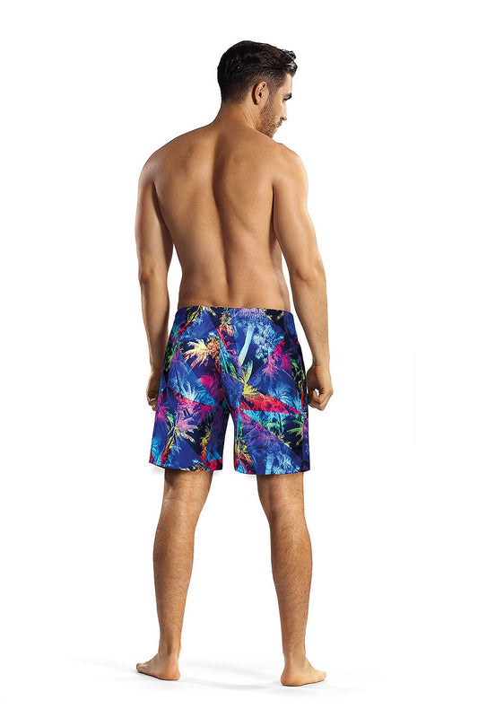 Back view of the Lorin Luxury Swim Trunks designed with a colourful tropical pattern, worn by a model highlighting the comfortable fit and adjustable waist, ideal for upscale swimming and leisure.