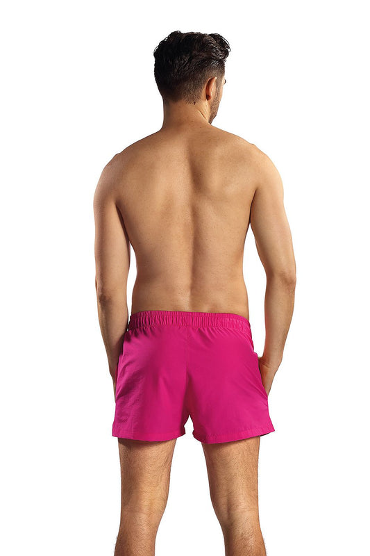 Back view of Lorin luxury swim trunks in striking pink, showcasing the comfortable fit and design ideal for beach days and pool parties.