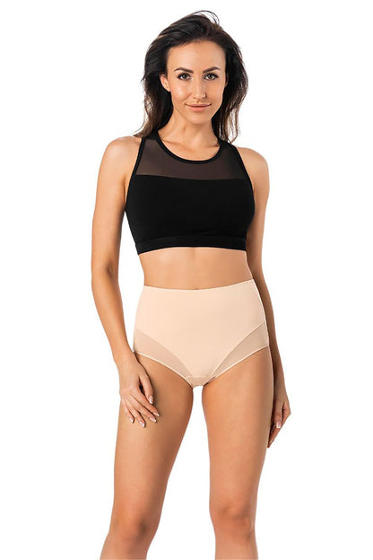 Stylish female model wearing a black crop top and nude high-waisted cotton classic panties by Teyli, demonstrating modern elegance.