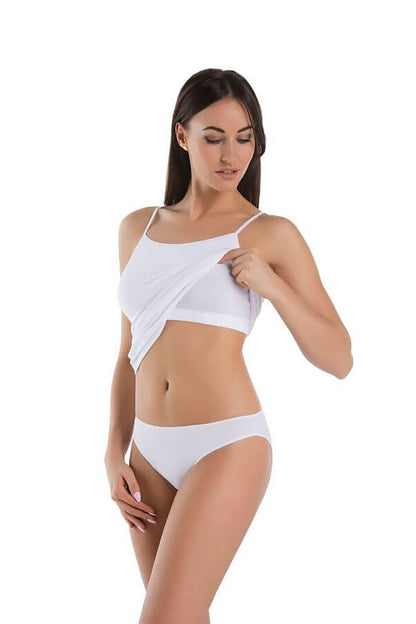Stylish women's white stretch top by Teyli, demonstrating the adjustable design while providing built-in support, perfect for versatile styling.